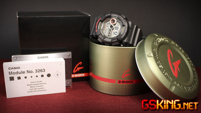 Casio G-Shock GD-100-1AER Lieferumfang: Verpackung, runde Metalldose, Bedienungsanleitung für Module No. 3263 und Garantie-Karte